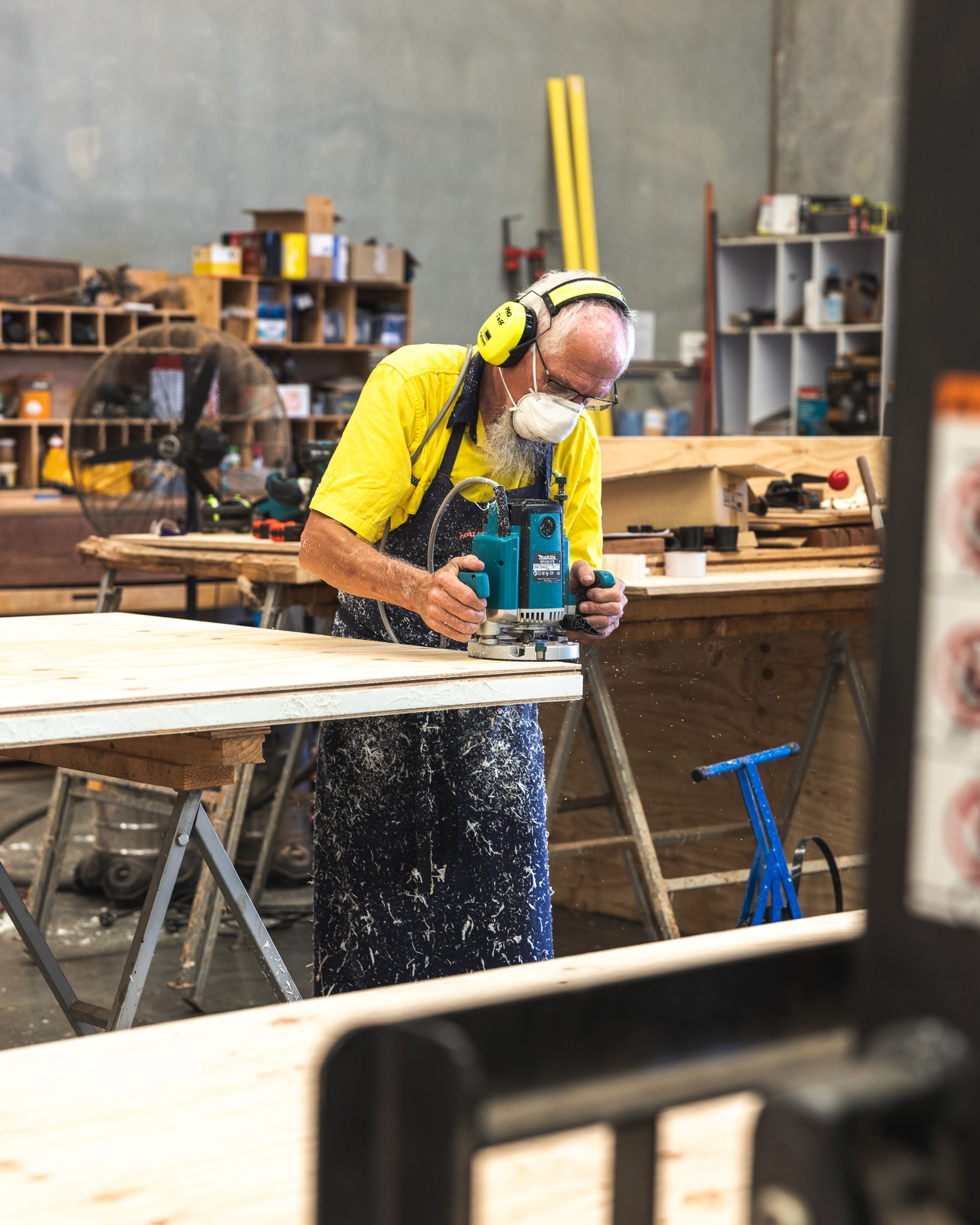 Platinum "R" Floor structural insulated flooring panel being machined in the Queensland factory, plywood skin over insulated core visible