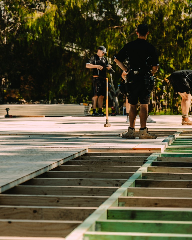 Platinum "R" Floor structural insulated flooring panel installed over timber floor joists during a residential subfloor build